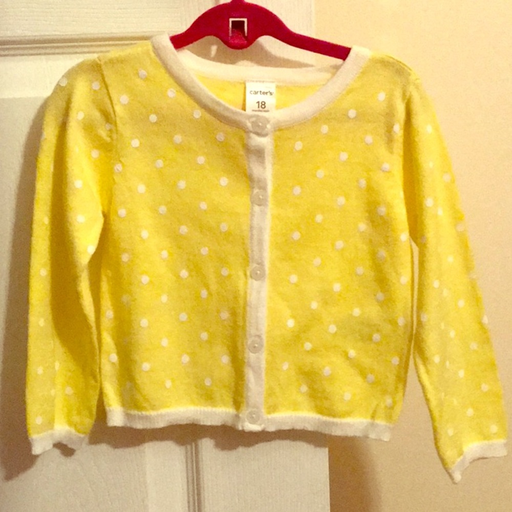 Yellow and white button down cardigan.
